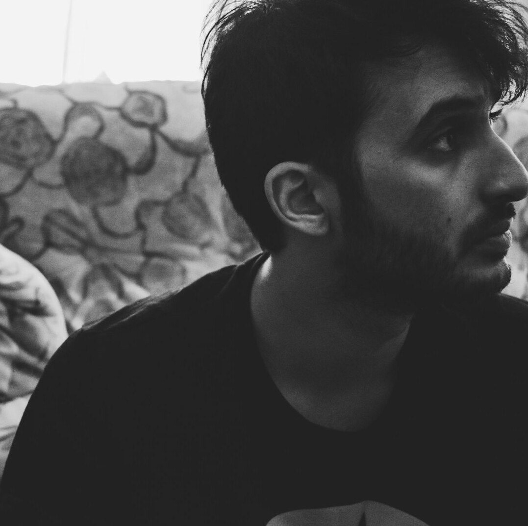 Portrait of a young man with a light beard